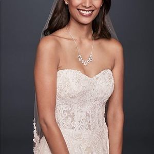 Brand new Wedding dress. NEVER WORN